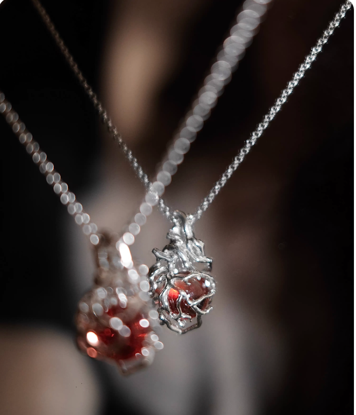 The "Caged Ember" Heart Pendant