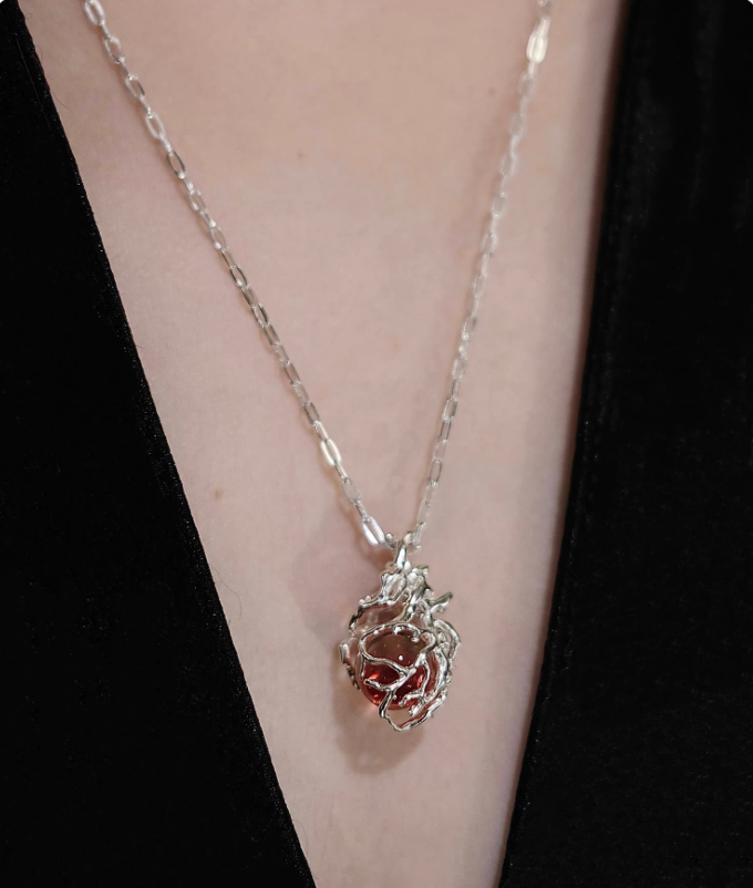 The "Caged Ember" Heart Pendant